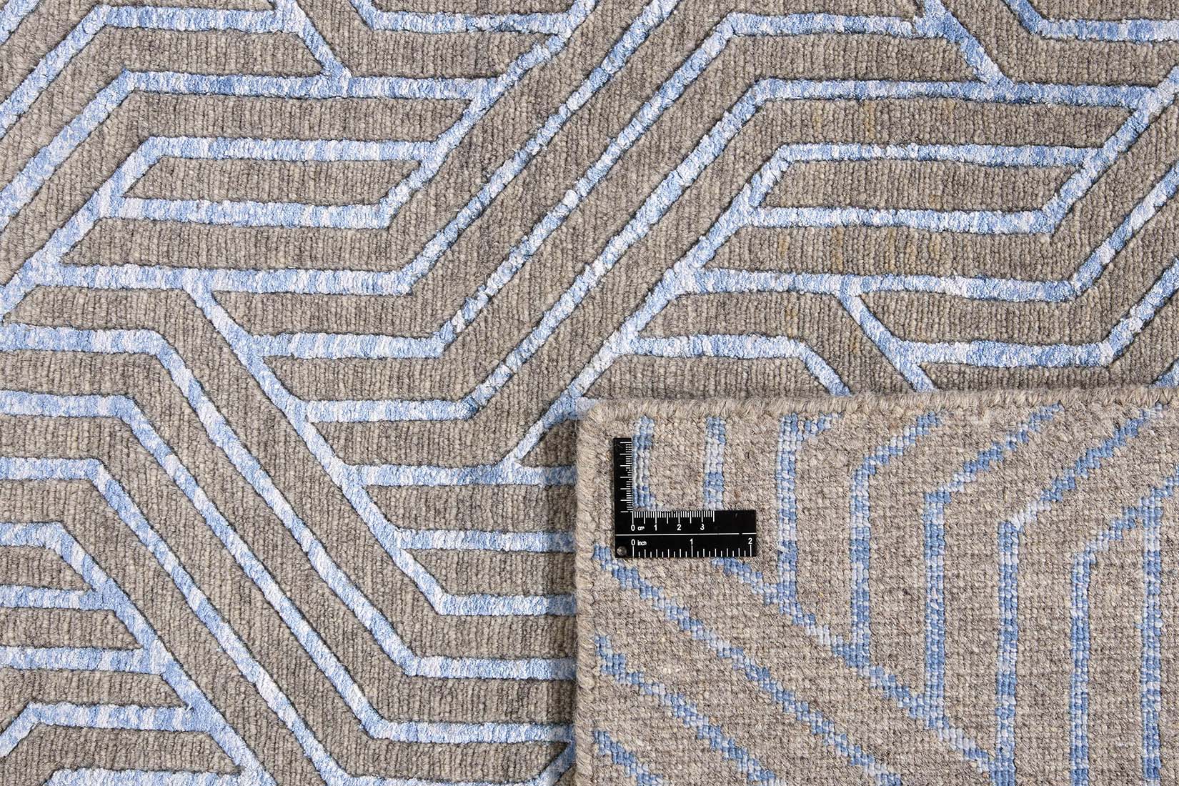 viscose and wool geometric rug in grey and blue
