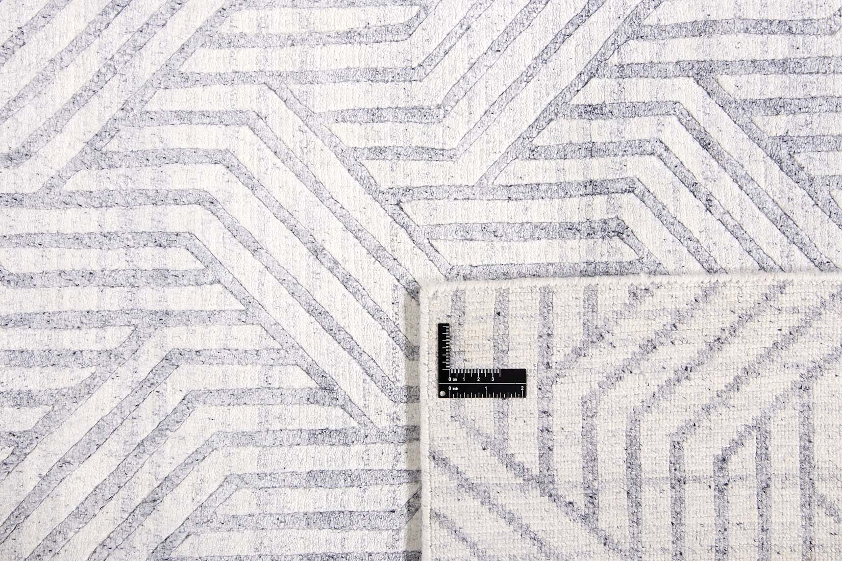 viscose and wool geometric rug in white and grey
