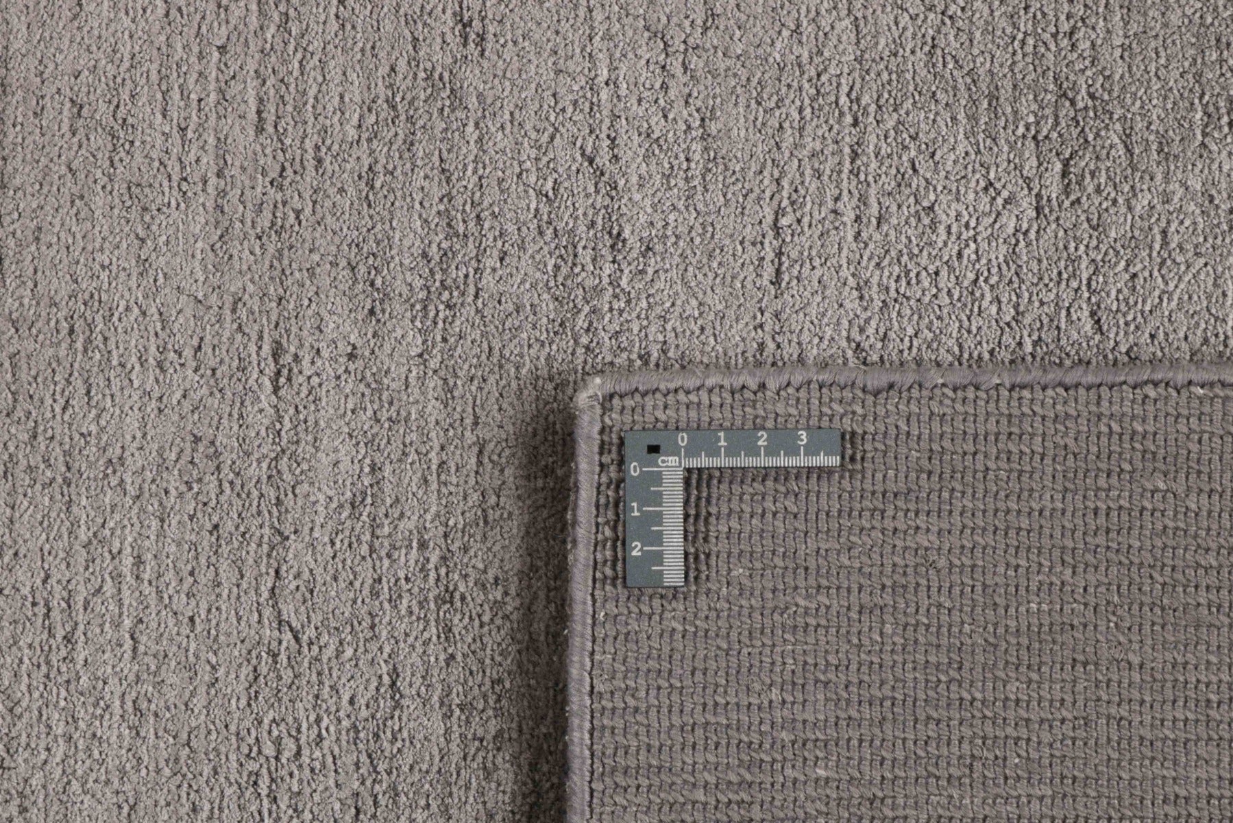 large plain grey and black rug

