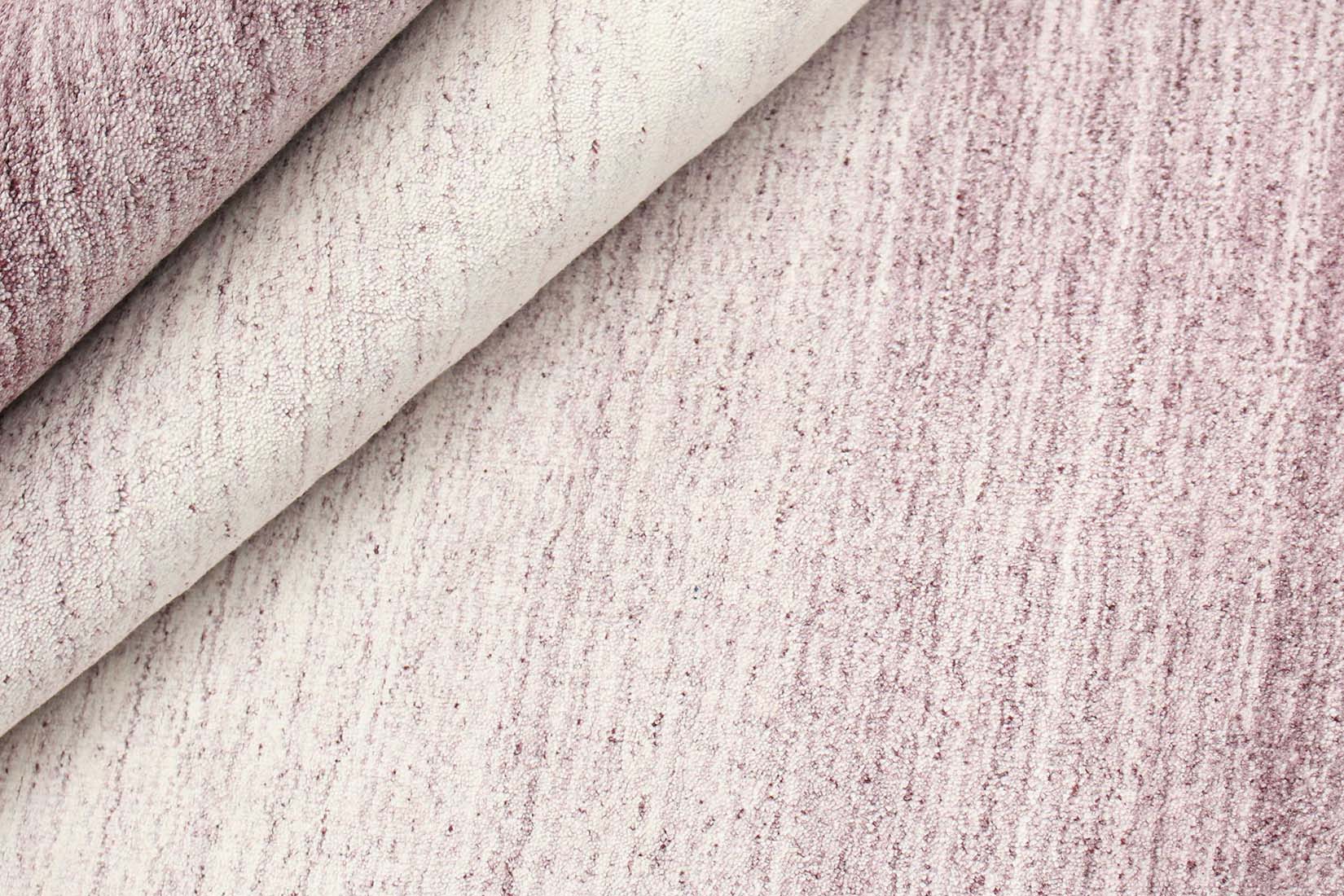 purple and pink ombre rug