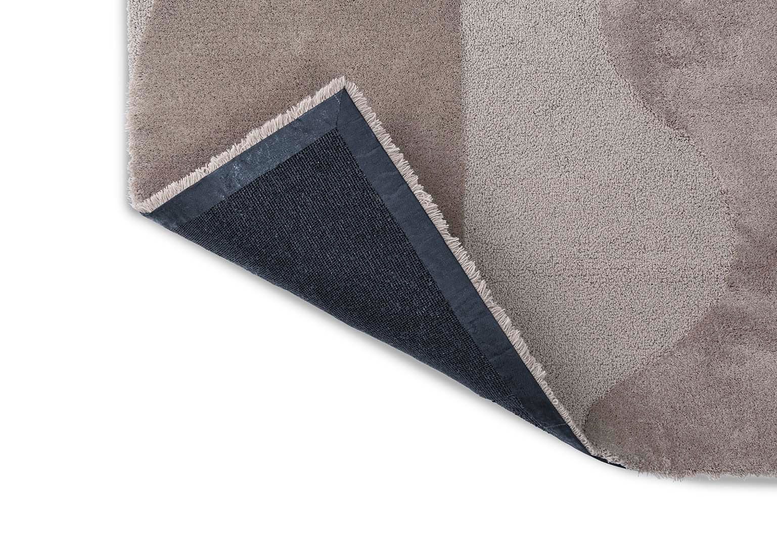 beige wool rug with geometric textured design

