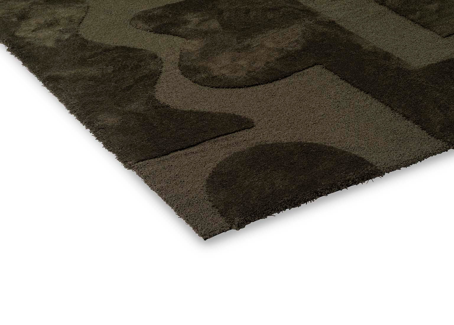 forest green wool rug with geometric textured design
