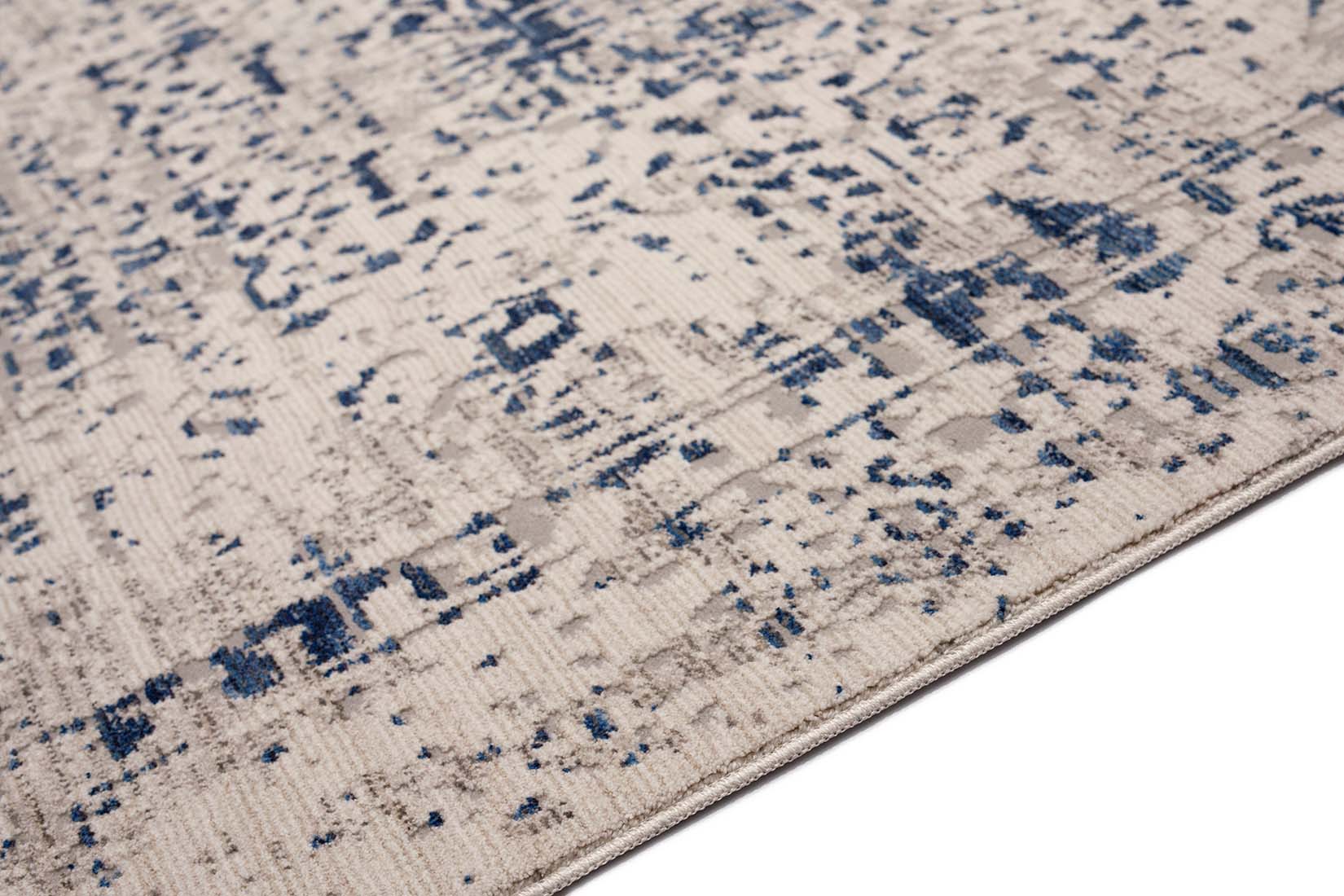 grey Persian style area rug with navy detail
