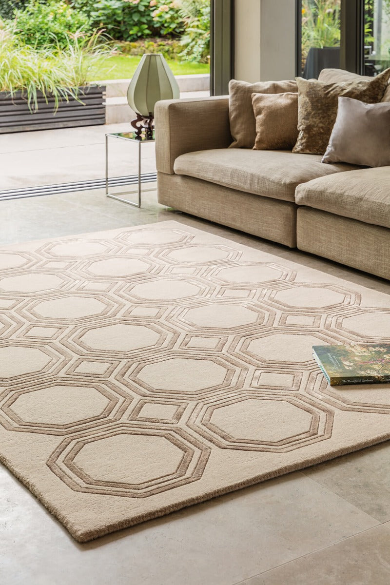 beige rug with a geometric pattern