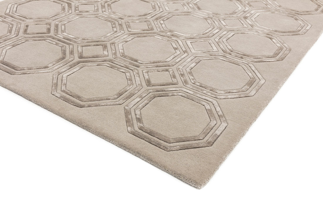 silver and beige rug with a geometric design