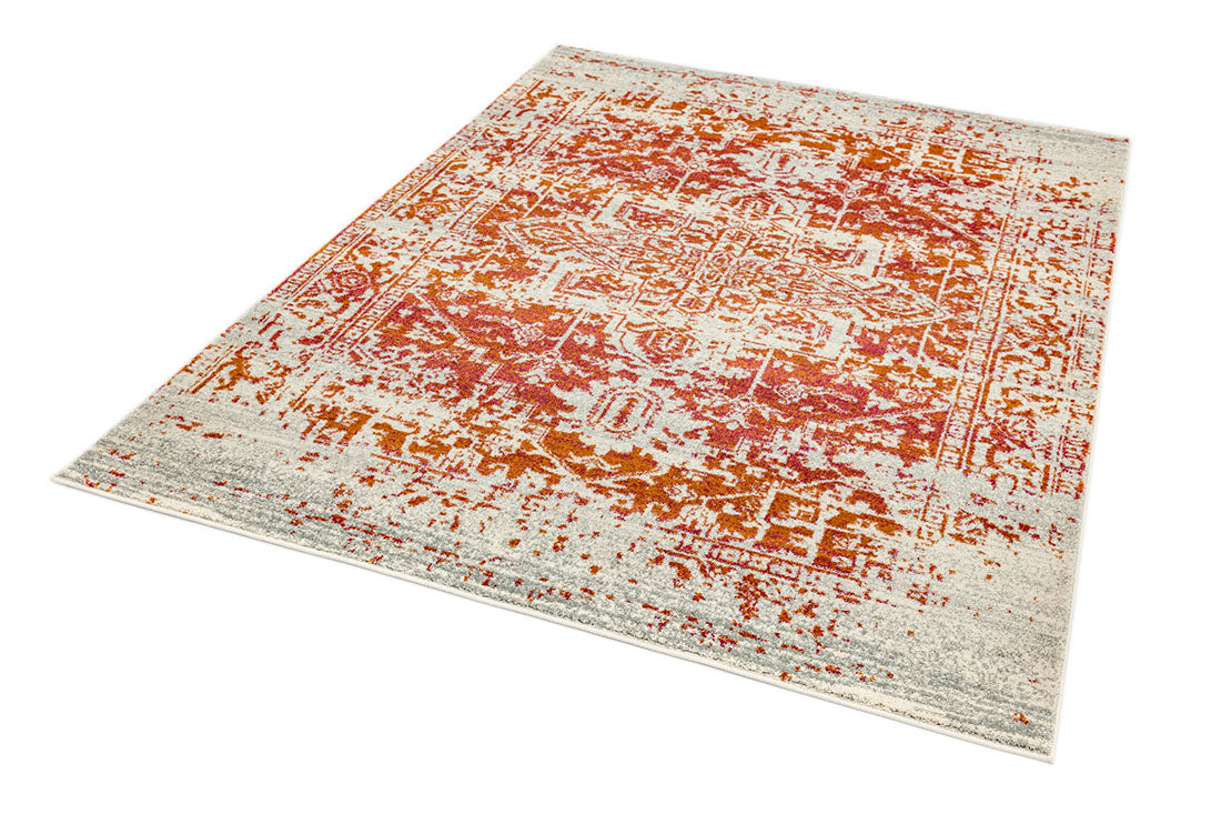 orange rug with an oriental design
