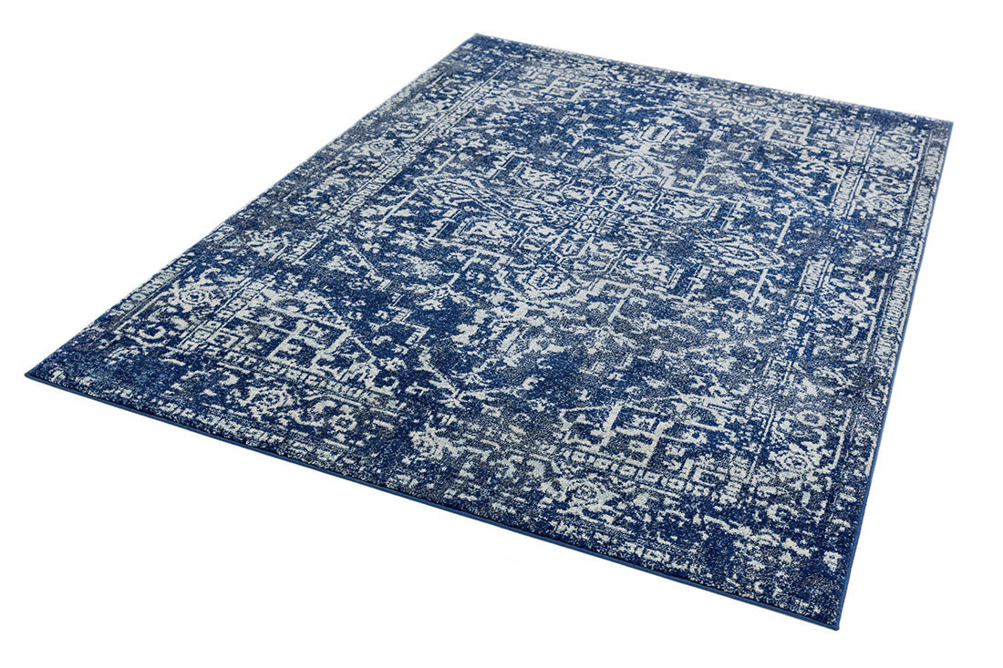 navy blue rug with an oriental design