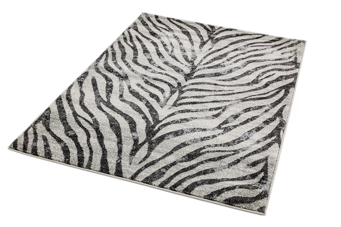 grey and white zebra print rug