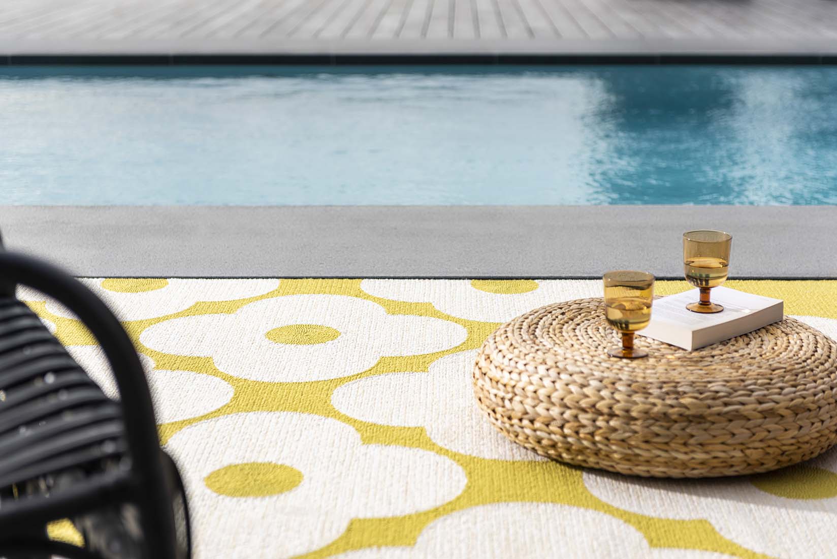 yellow indoor/outdoor rug with allover floral print
