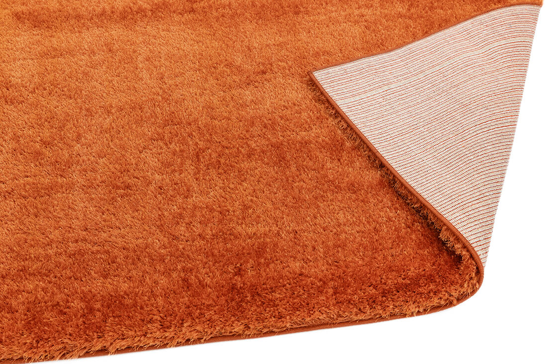 orange shaggy rug