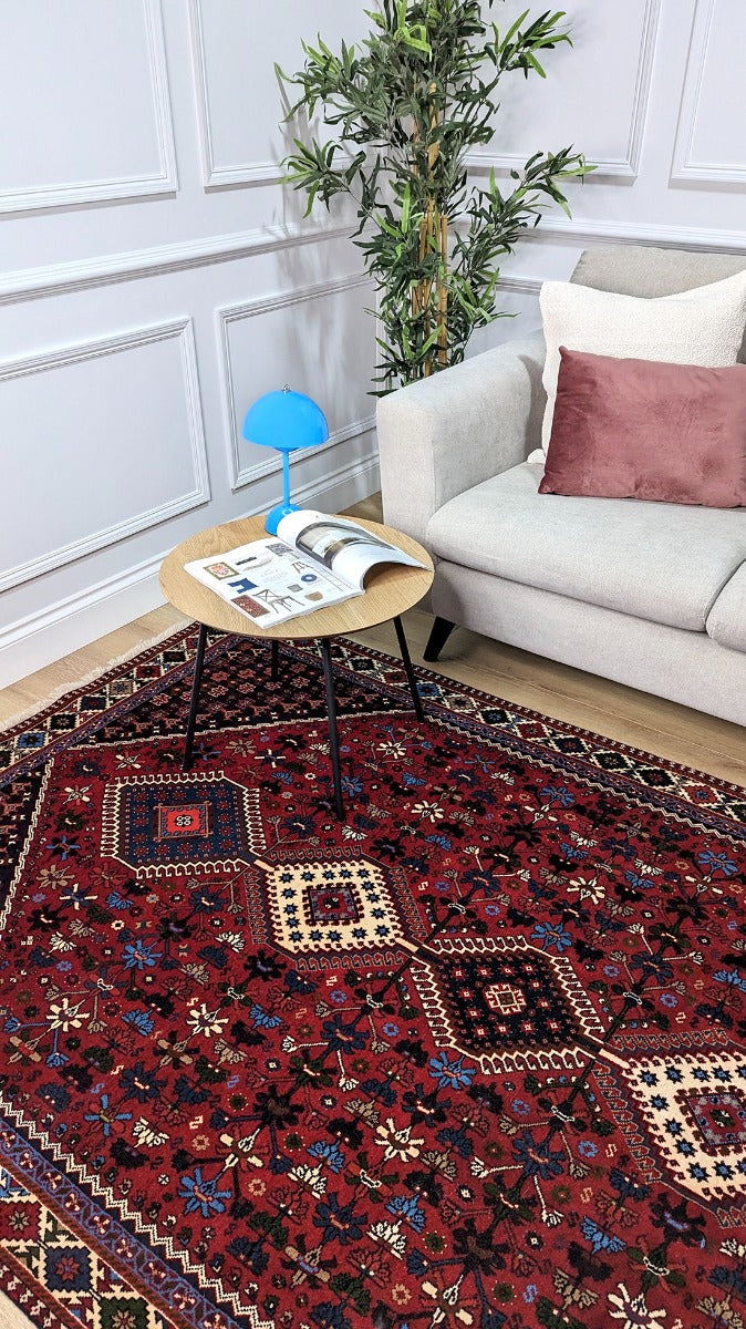 red Authentic persian rug with a traditional design