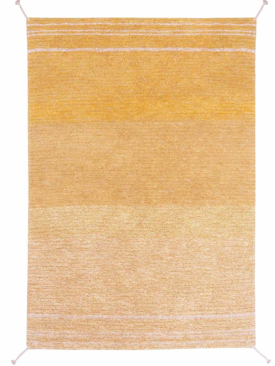 reversible textured rug in beige and yellow with soft gradient design