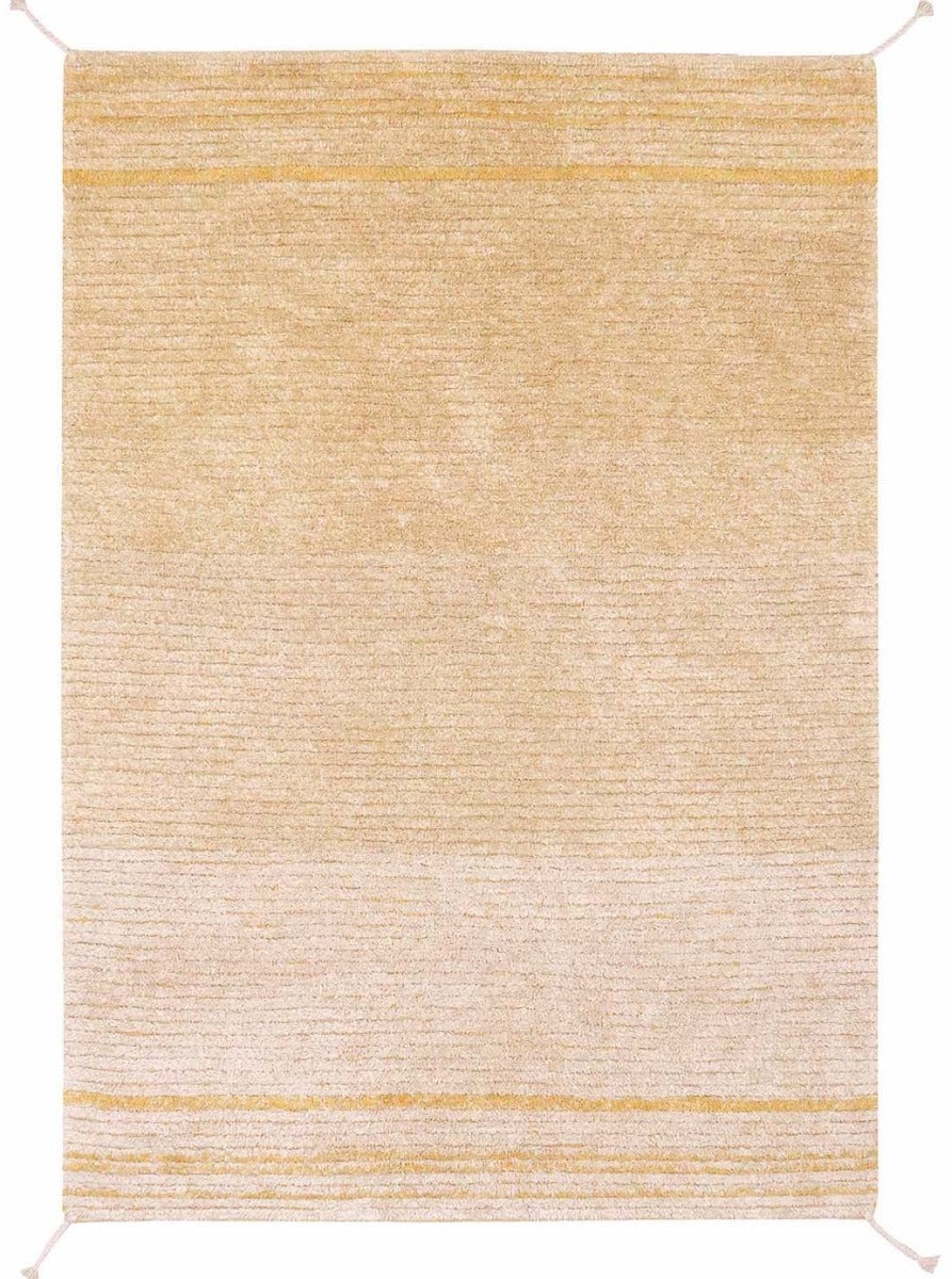 reversible textured rug in beige and yellow with soft gradient design