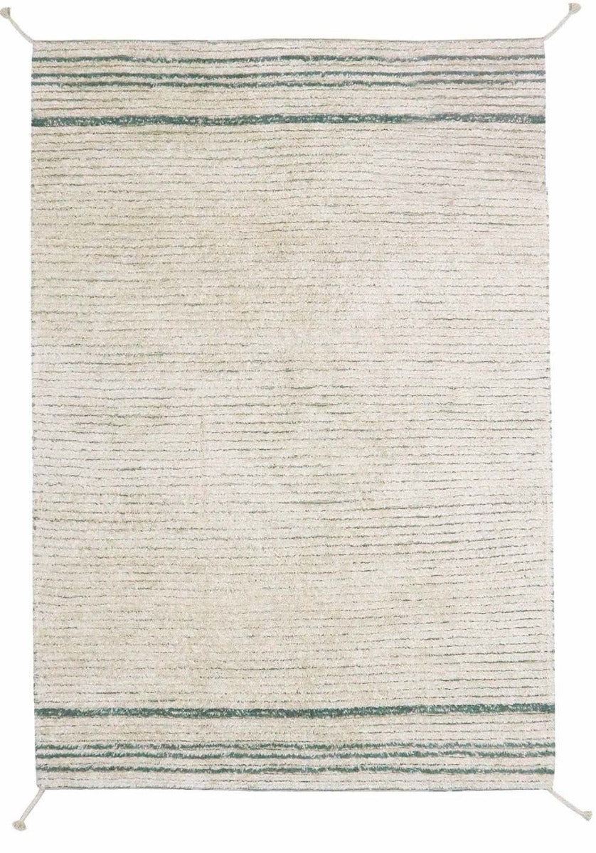 reversible textured rug in beige and blue with soft gradient design
