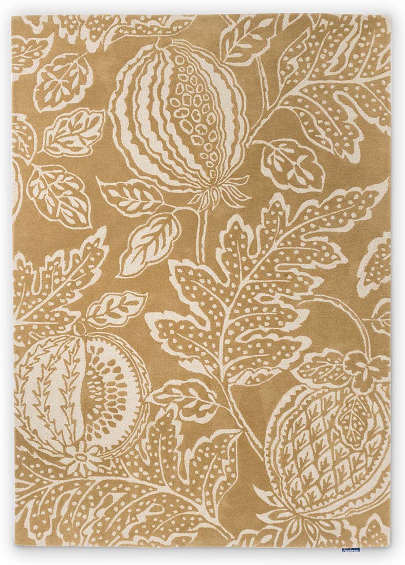 ochre wool rug with exotic fruit inspired design
