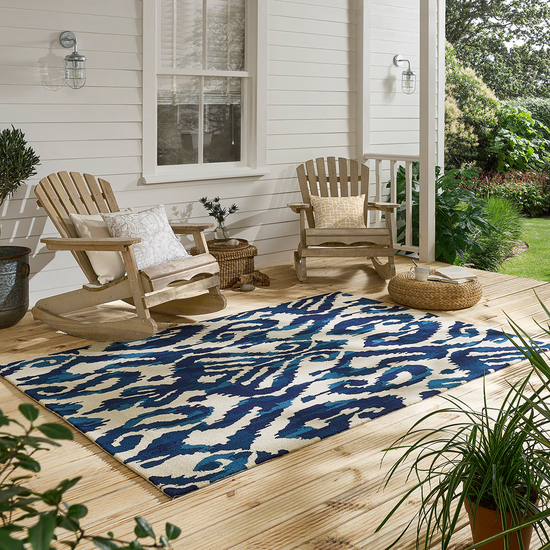 blue indoor/outdoor rug with abstract pattern

