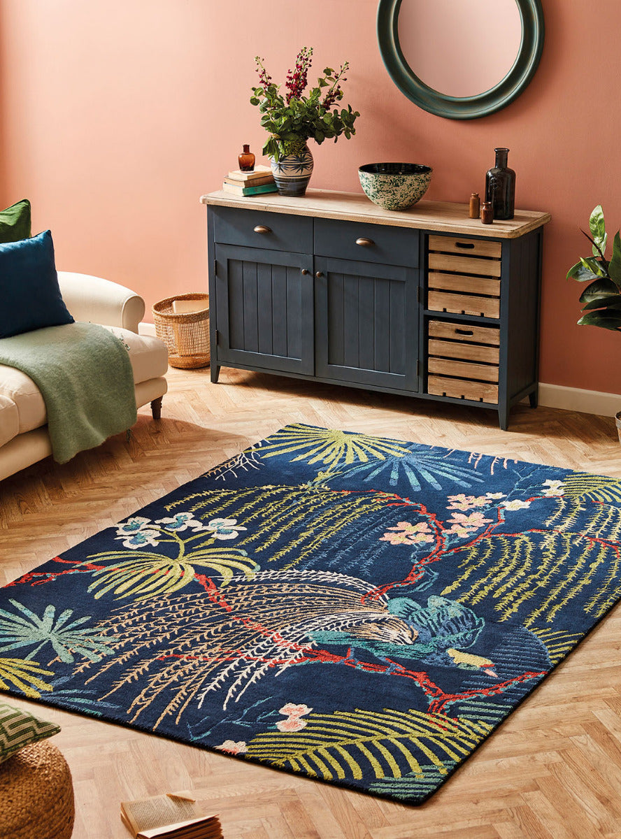 blue Sanderson wool rug with a multicolour floral design