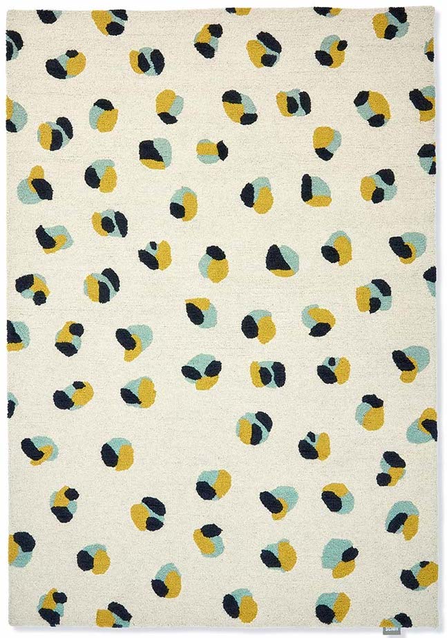 leopard dot rug in yellow, cream and blue 
