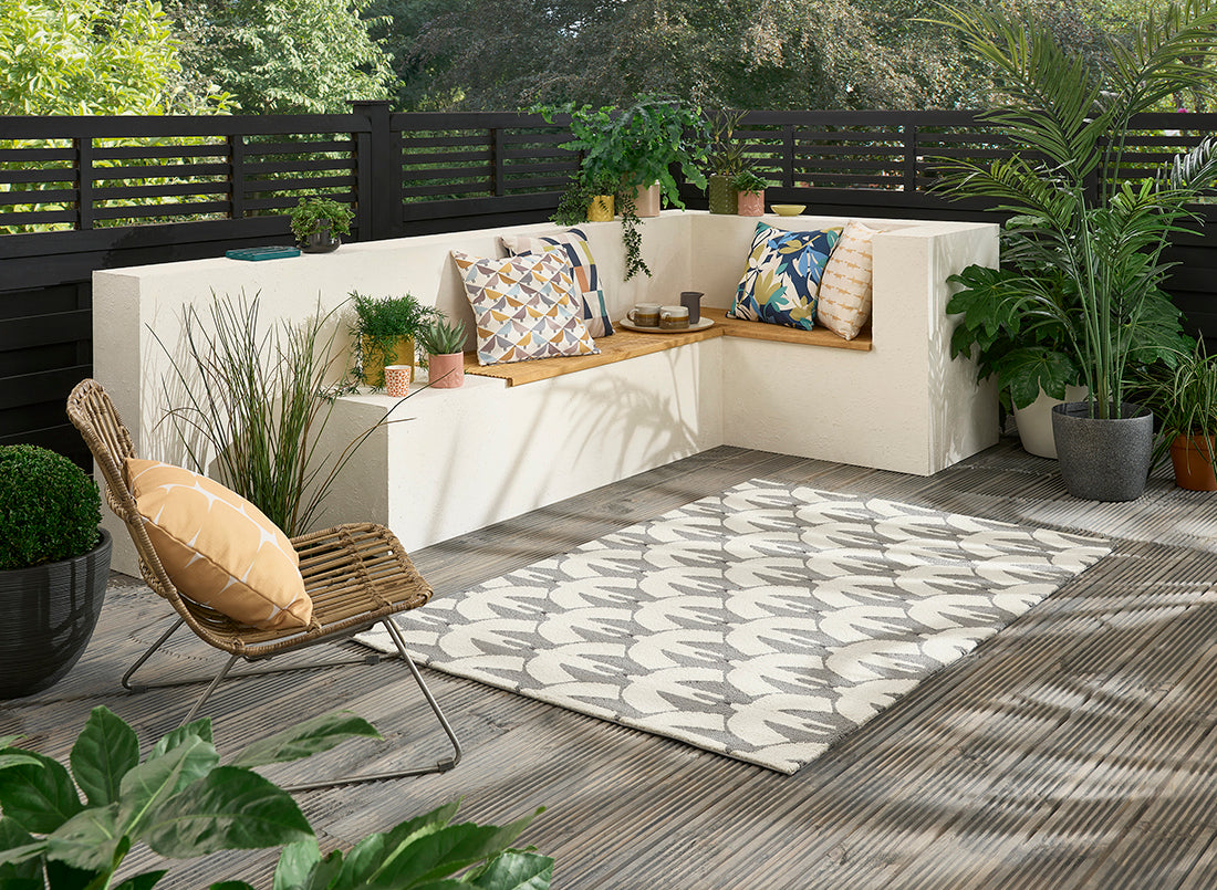 cream and grey indoor/outdoor rug with bird print
