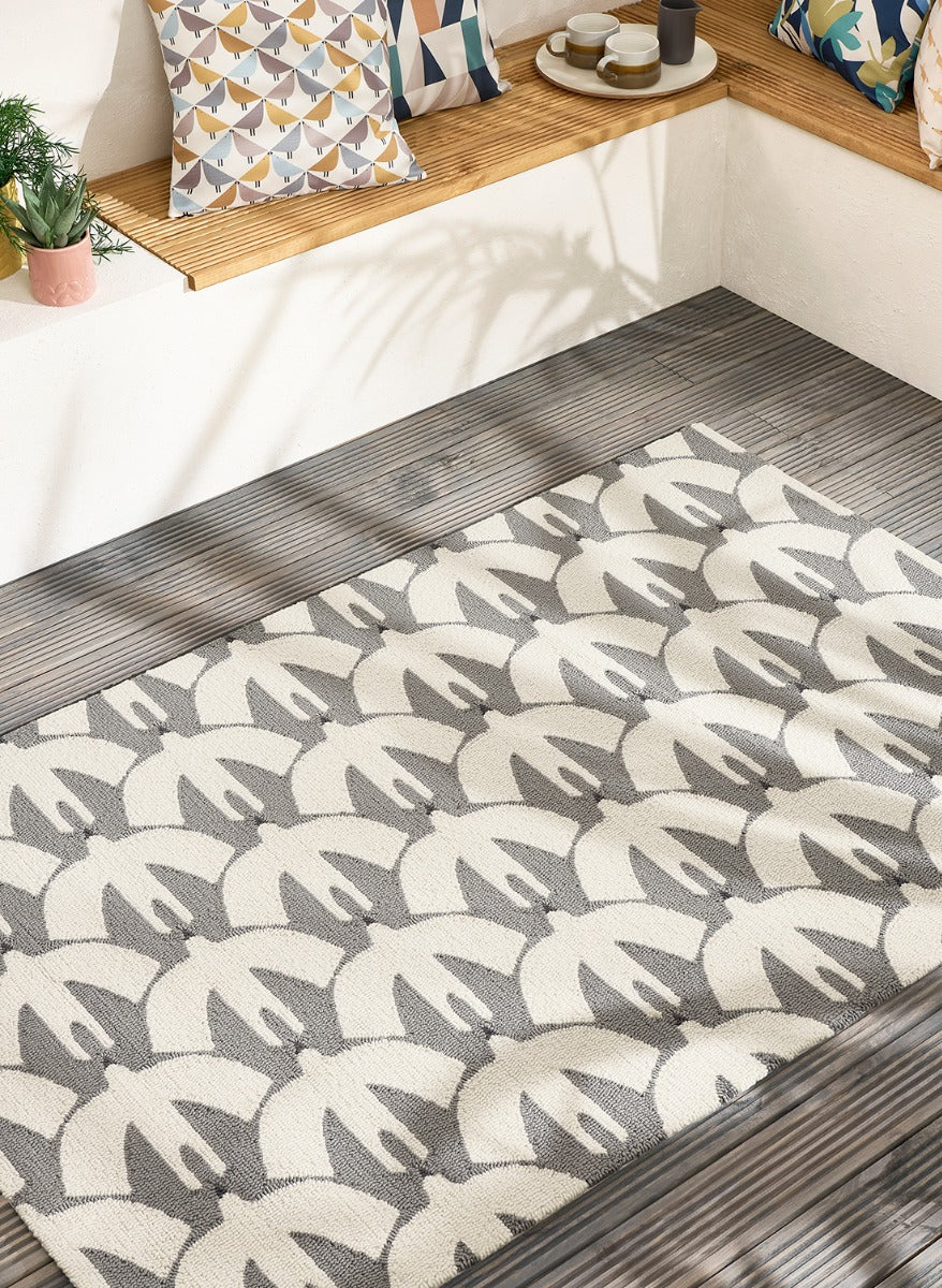 cream and grey indoor/outdoor rug with bird print

