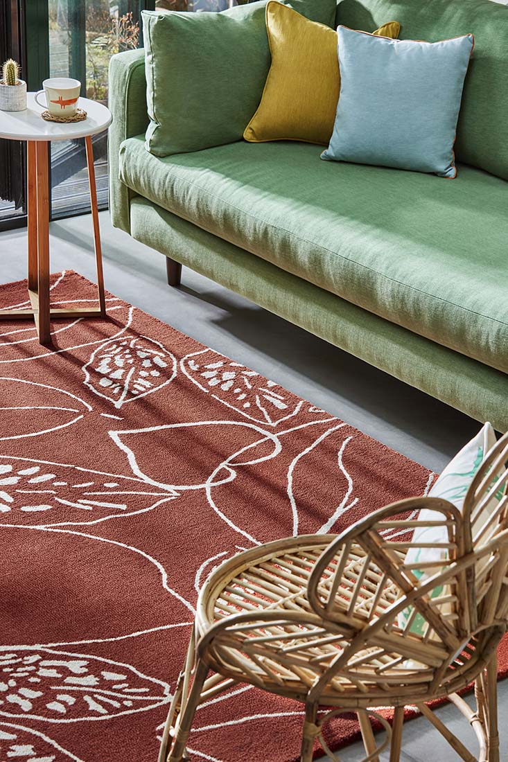 red rug with floral pattern
