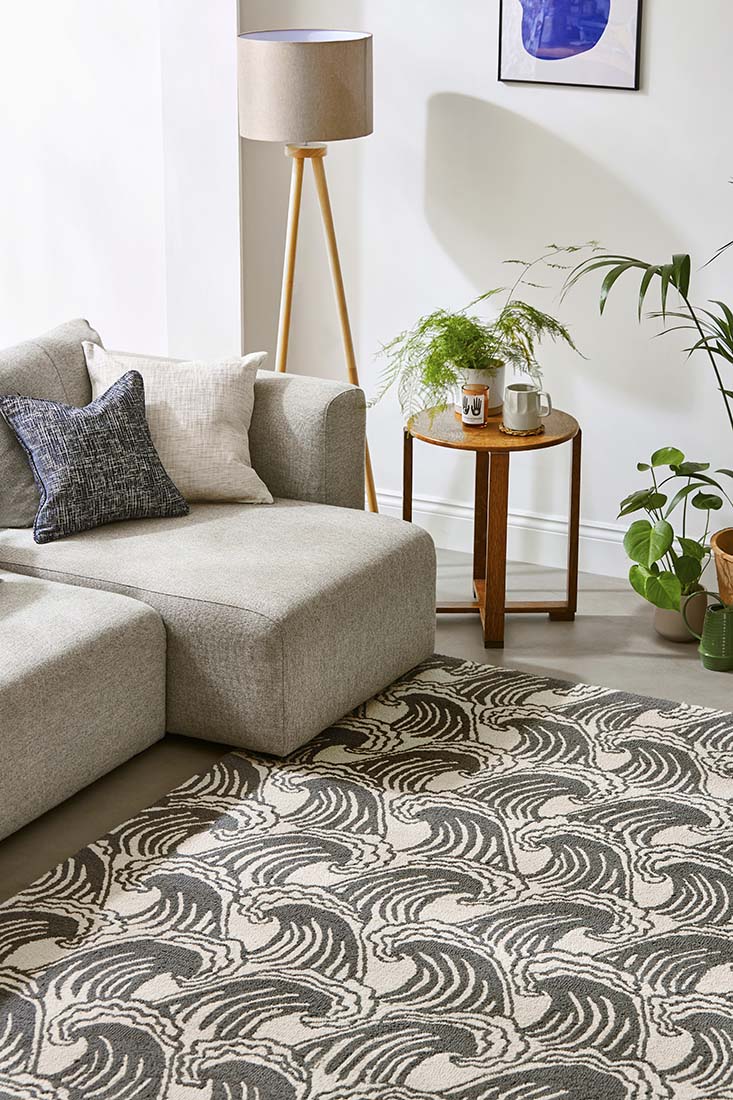 black and beige rug with wave design
