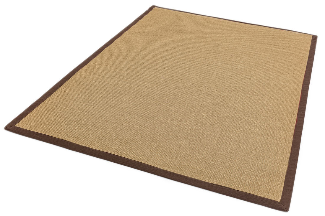 beige sisal rug with a brown border