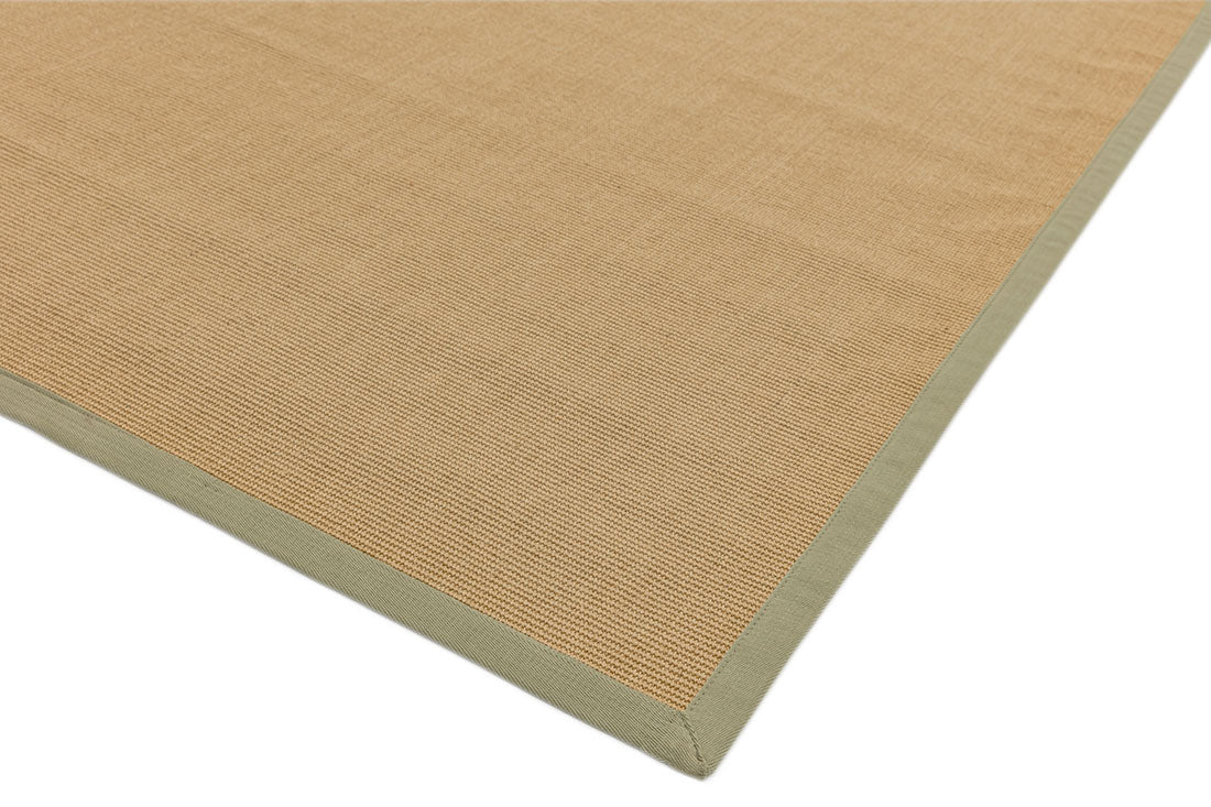 beige sisal rug with a sage green border