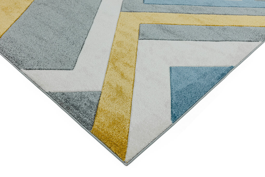 geometric grey and mustard rug