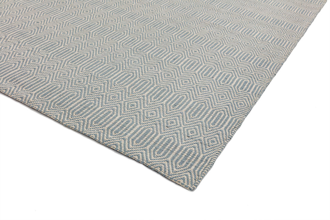 duck egg blue and white woven rug with aztec chevron pattern