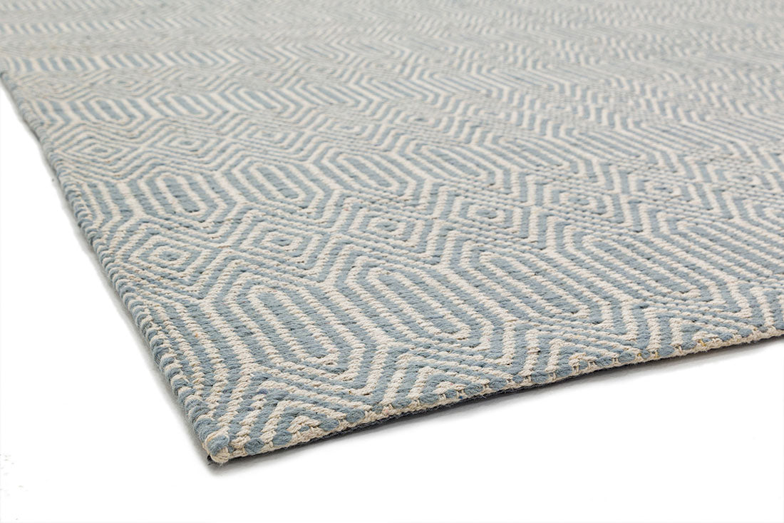 duck egg blue and white woven rug with aztec chevron pattern