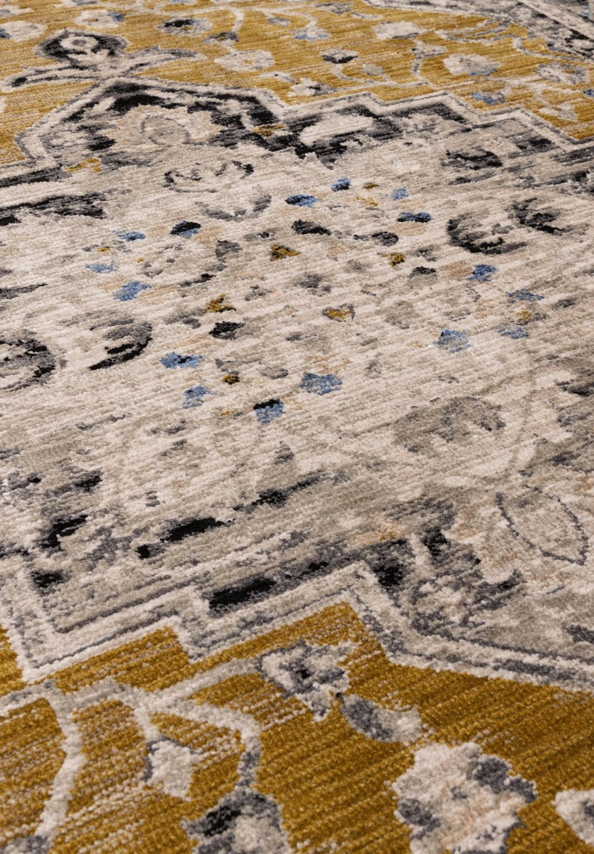 Vintage style distressed rug in hues of gold
