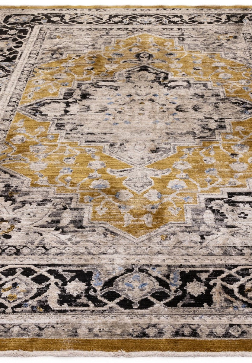 Vintage style distressed rug in hues of gold