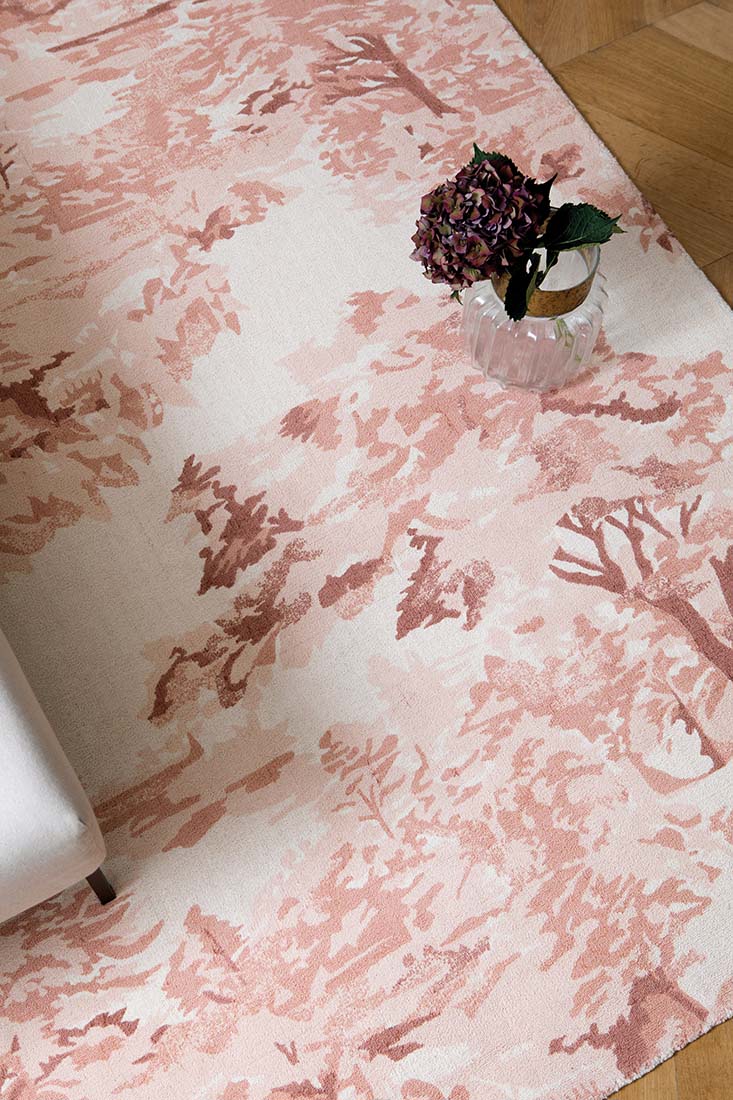 cream cotton rug with tree pattern in pink 
