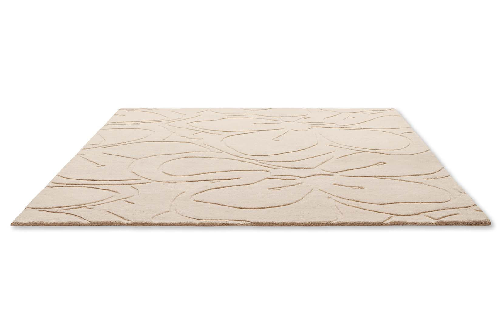 cream wool rug with shapes 
