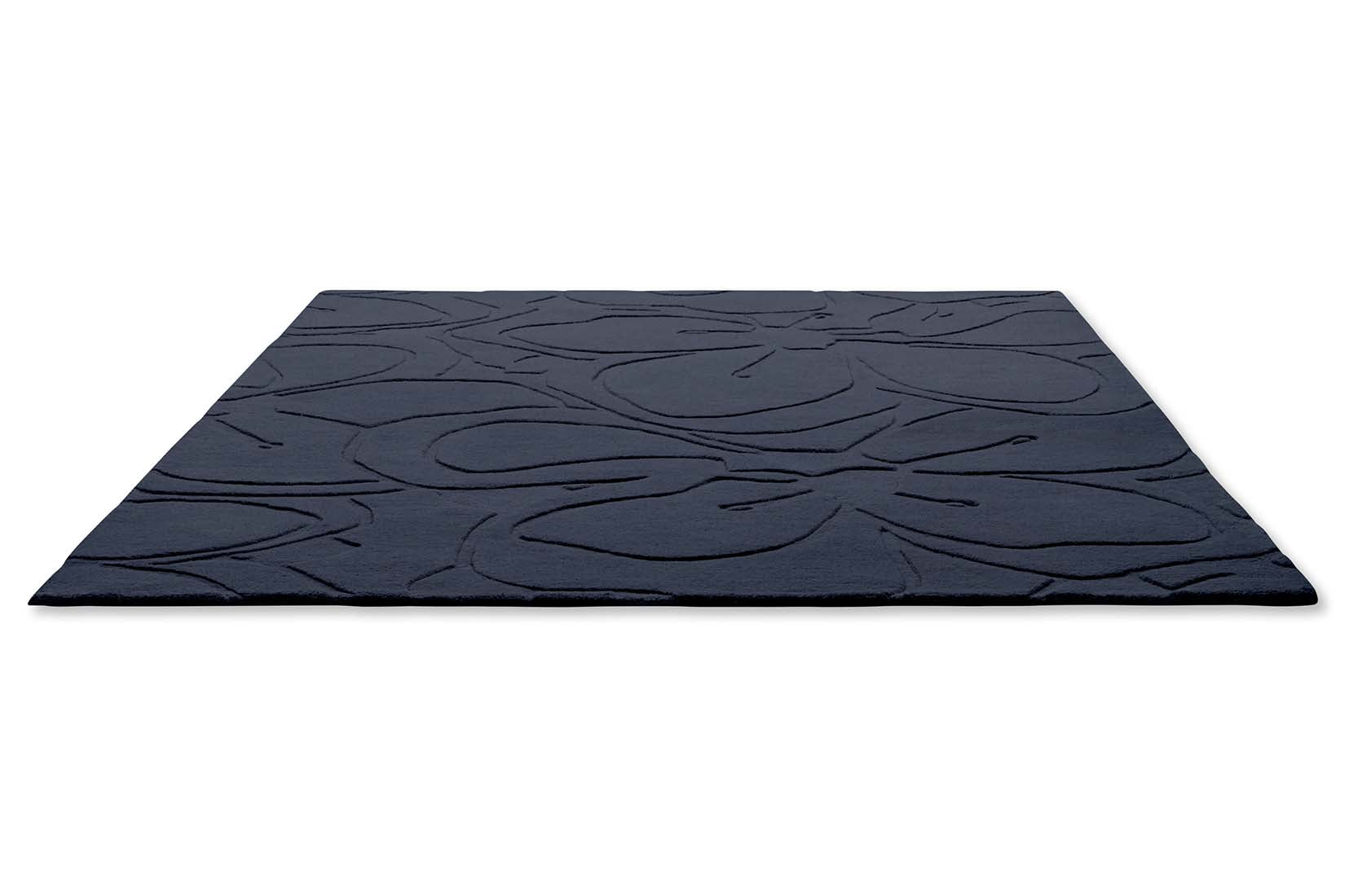 blue wool rug with floral shapes 
