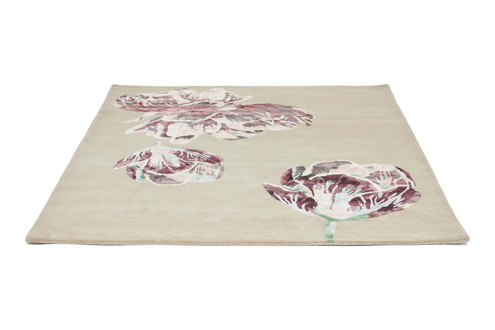 Rectangular beige rug with large white and purple flower motifs