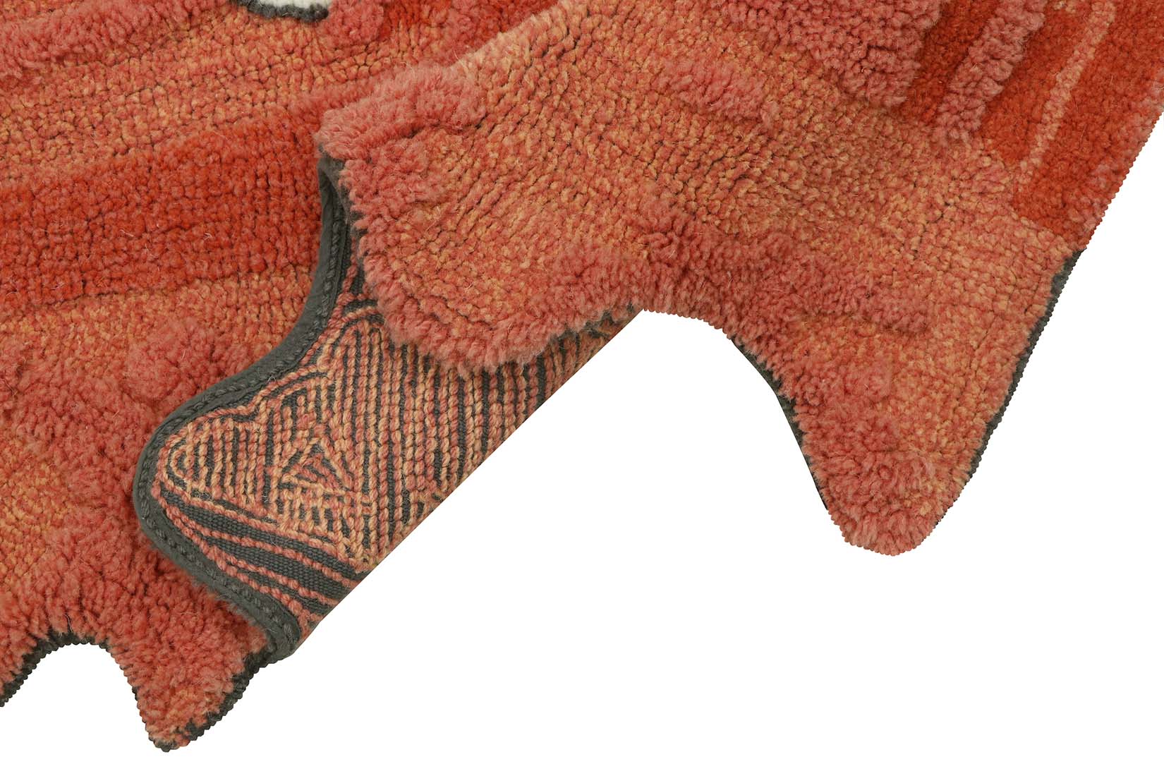 playful ghost character shaped orange wool rug
