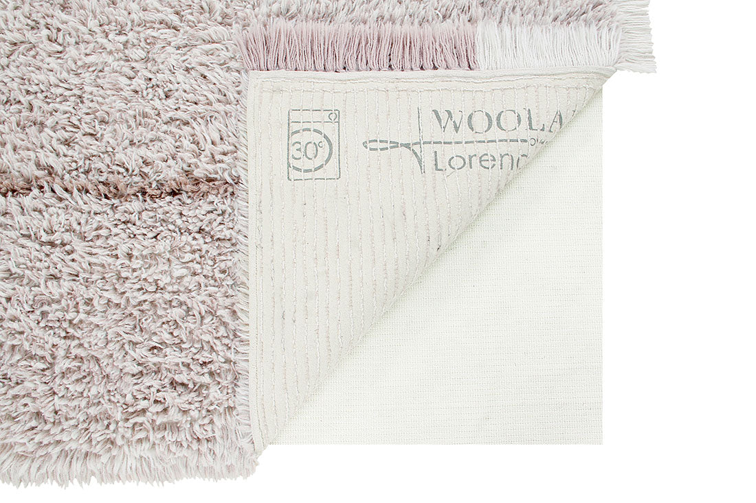 bohemian lorena canals woolable rug with a simple abstract design in beige