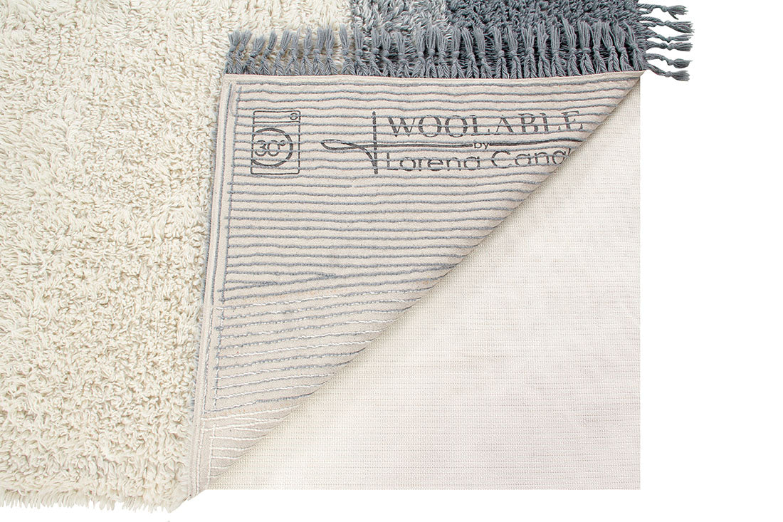 lorena canals washable wool rug with a simple block design in blue and beige