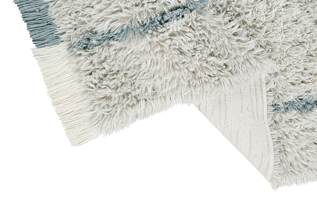 bohemian lorena canals woolable rug with a simple abstract design in blue and cream