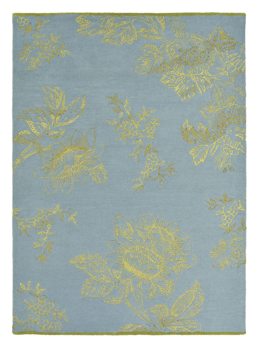 Rectangular blue rug with gold floral design