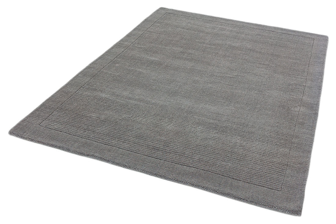 A plain grey rectangle-shaped wool rug with thin border.