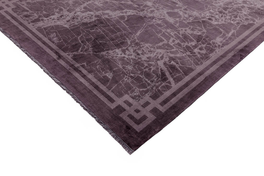 purple bordered rug